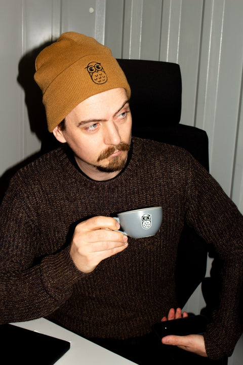 Leo Beanie in Caramel, worn in the Chipp roastery